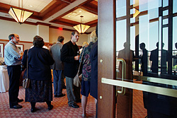 Photo of people at a meeting in the Fluno Center