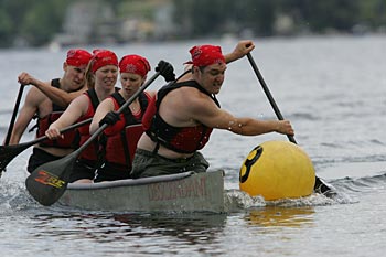 Students competing in concrete canoe competition.