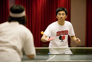 Students playing table tennis