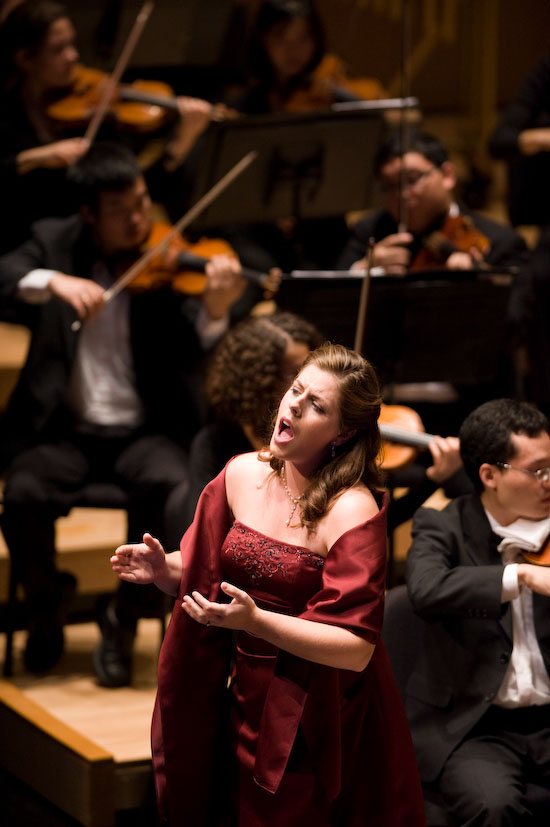 Photo of Emily Fink singing.