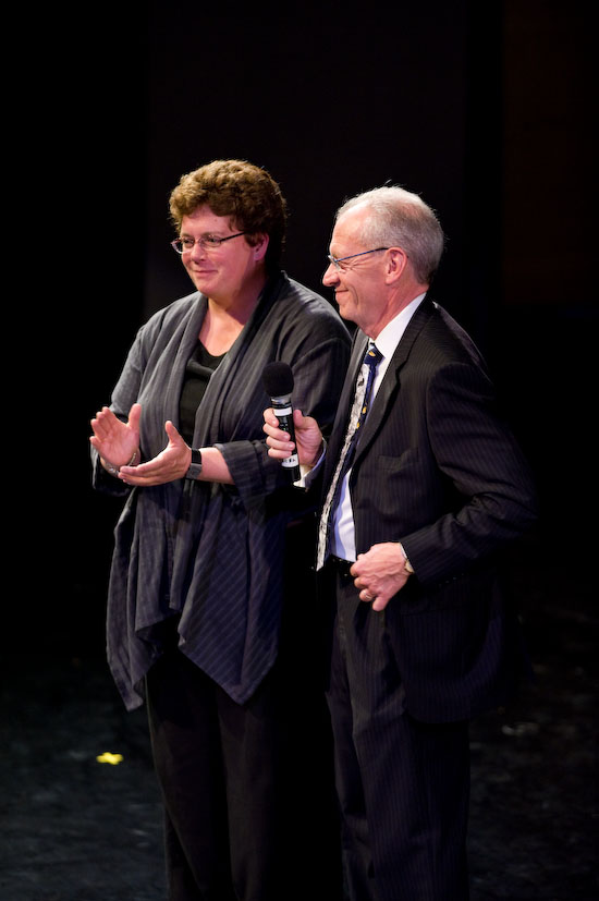 Photo of outgoing Chancellor John Wiley and incoming Chancellor Carolyn "Biddy" Martin at Overture Hall making announcements about two anonymous donor gifts.
