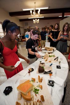 Photo of guests sampling local cheeses.