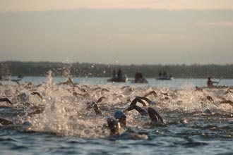 Photo of Ironman contestants during the swim portion of the event.