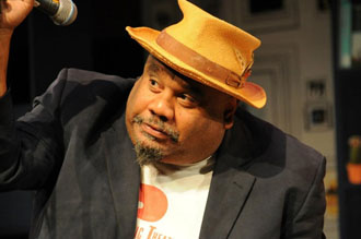 Photo of Stew performing.