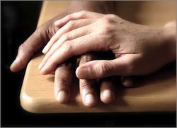 Photo: one hand holding another