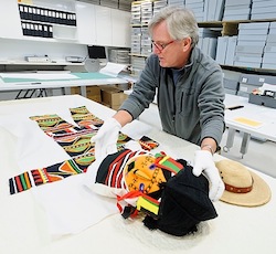 Photo: worker preparing Nigerian costume