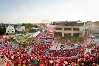 Photo of thousands of Badger fans preparing for the first football game of the season at Union South.