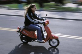 Photo: Moped rider