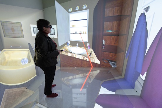 Photo: Professor Brennan in virtual reality ’CAVE’