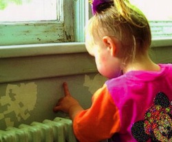 Photo: child near lead paint