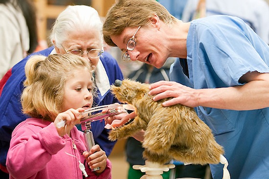 Photo: child intubating model of dog