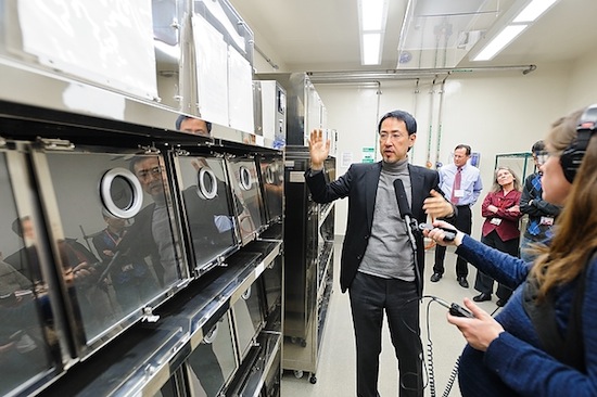 Photo: Yoshihiro Kawaoka talks to media at flu lab