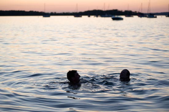 Photo of people swimming in Lake Mendota