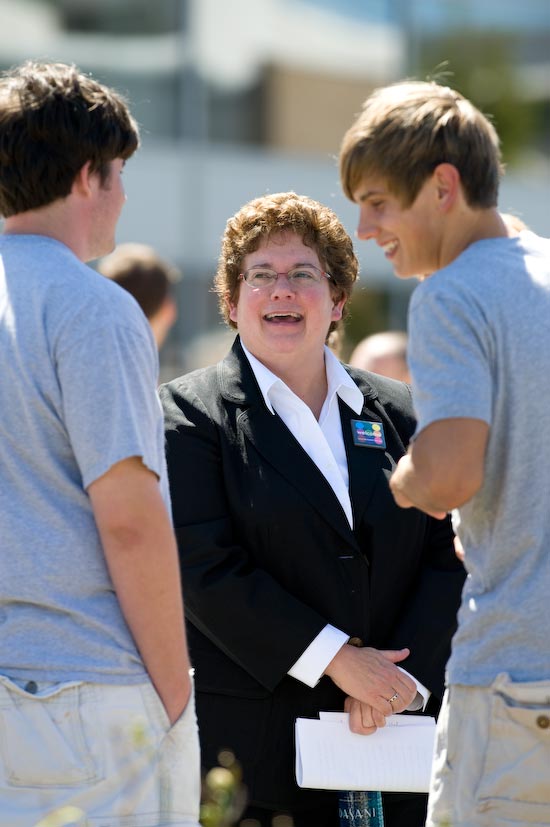 Photo of Chancellor Martin talking with two students