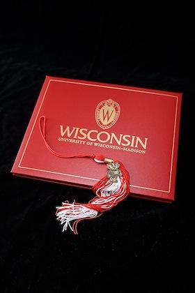Graduation tassel and diploma cover