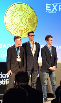 Photo: Taylor Fahey, Charles Haider, Cedric Kovacs-Johnson (left to right) receive their award.